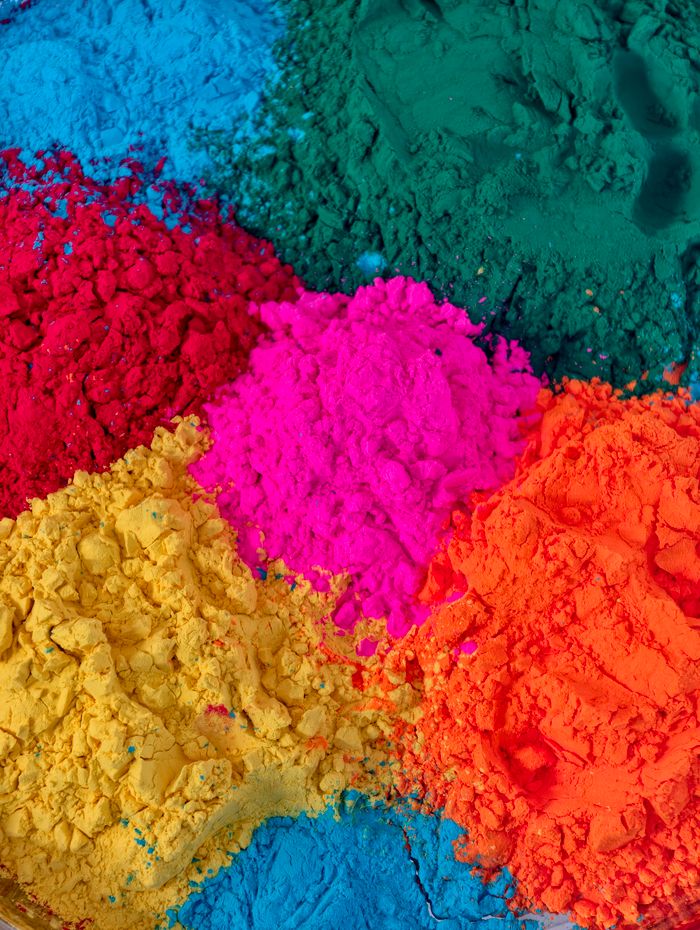 pexels-photo-36425051-36425051 Colorful Holi powders display vibrant hues for festive celebration.